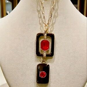 Heidi Daus Black, Gold, and Red Art Deco Pendant.